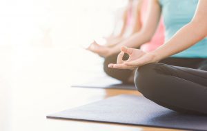 Mindfulness yoga on a mat